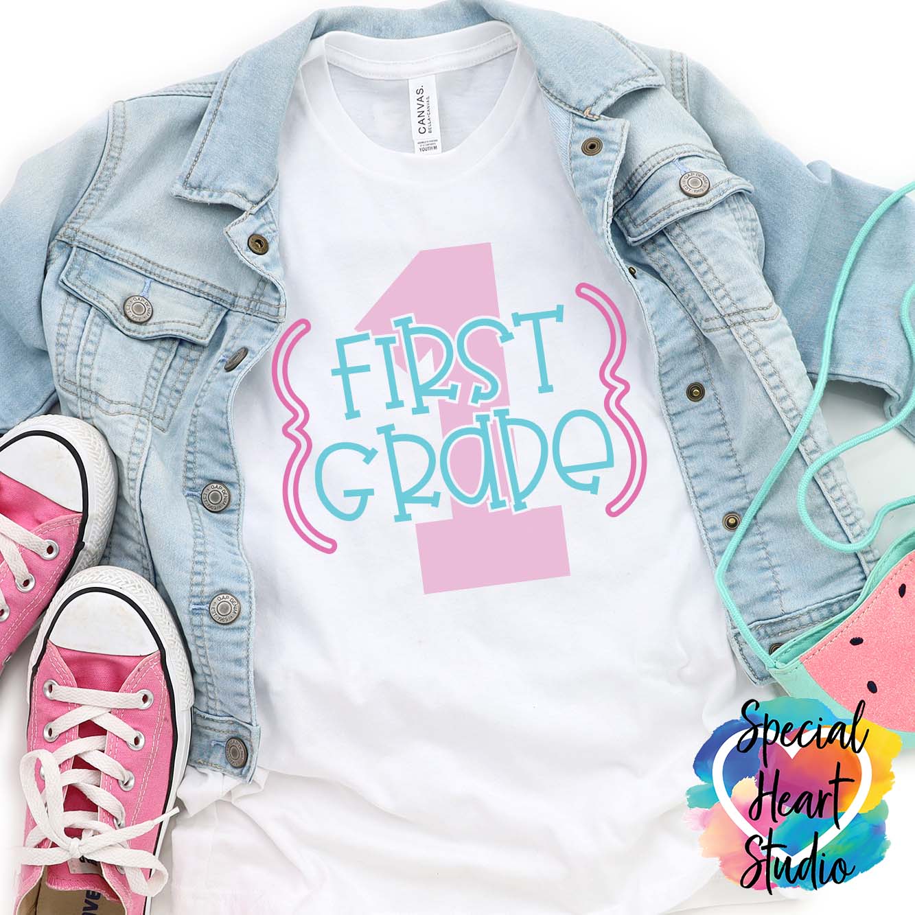 First Grade 1 SVG on white shirt mockup with jean jacket